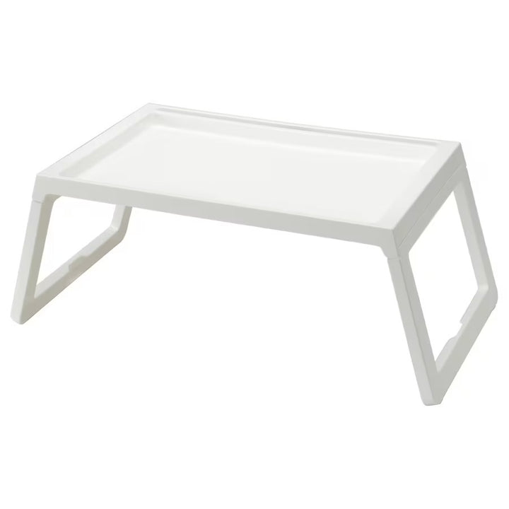 A white rectangular foldable bed tray with visible foldable legs.