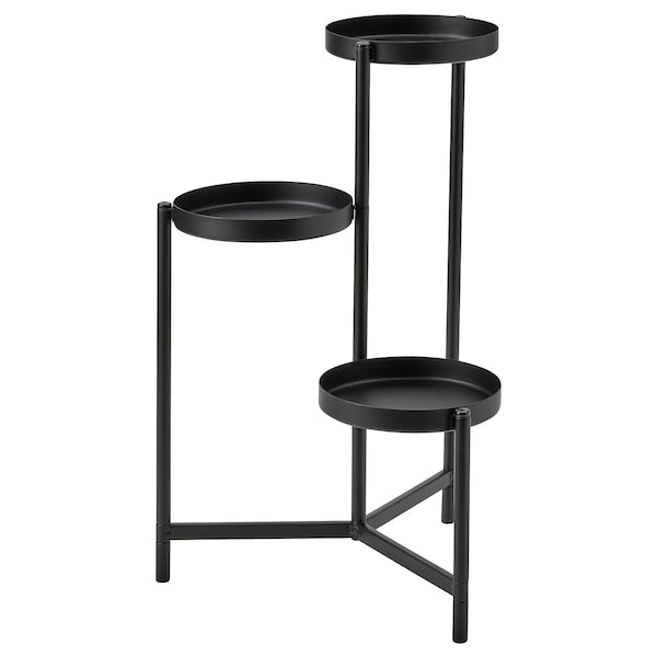 A black, three-tiered plant stand with a minimalistic design, featuring shelves at different levels on a trolley base.