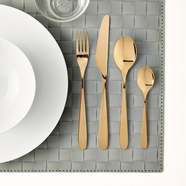 IKEA TILLAGD N 24-Piece Brass Cutlery Set on Table